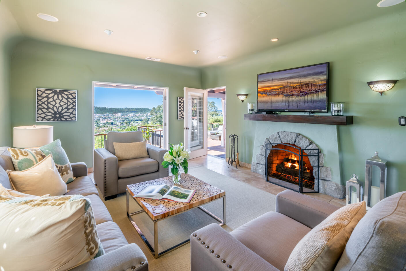 511 Drexel Drive Santa Barbara, CA 93103 - Photo 8 of 27 a living room with furniture and a flat screen tv