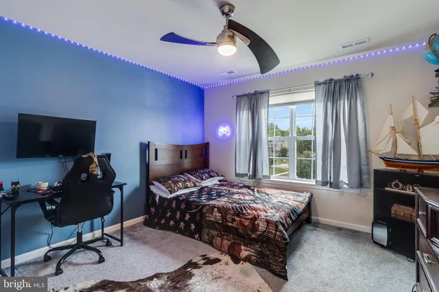 a view of a workspace with furniture