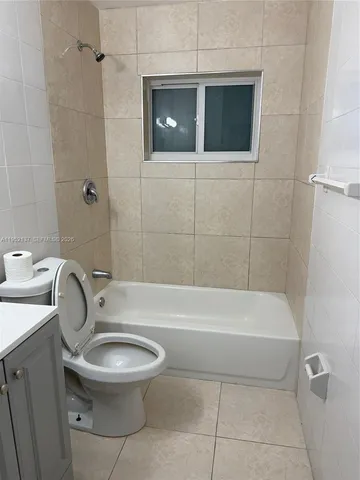 an empty room with an empty space and a window