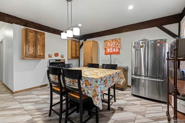 a view of a livingroom with furniture window and wooden floor