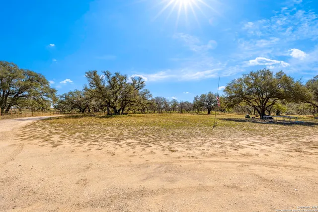 a view of swimming pool with a yard