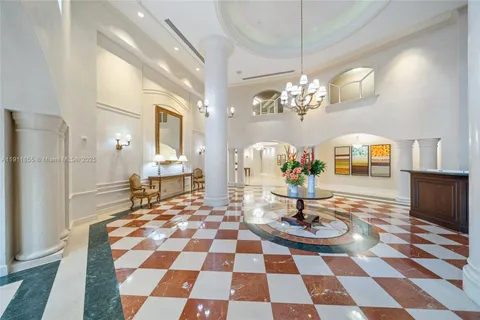 a view of a swimming pool with a garden and trees