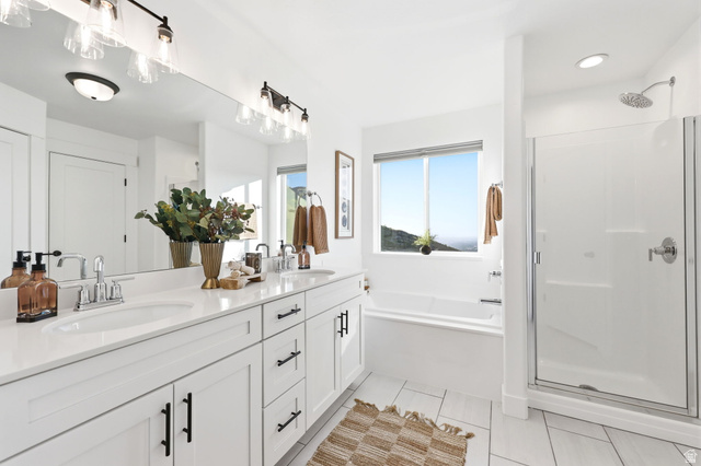 2457 South Springtime Road Draper, UT 84020 - Photo 24 of 48 bathroom with a dual vanity, white cabinetry, and a spacious glass-enclosed shower