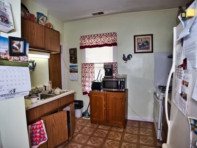 a room with furniture and wooden floor