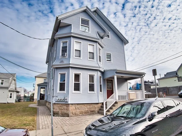 a front view of a house with swimming pool