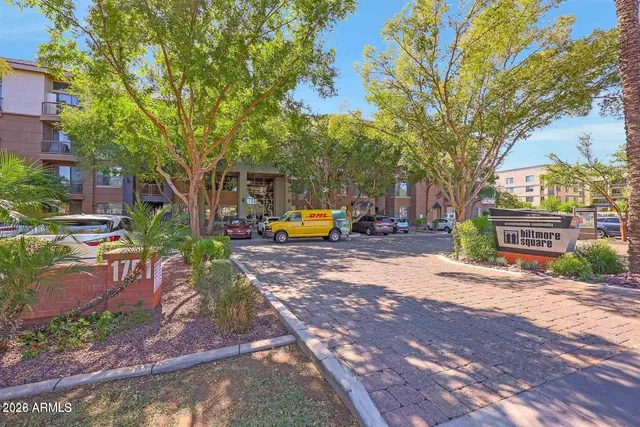 a living room with a couch and a table