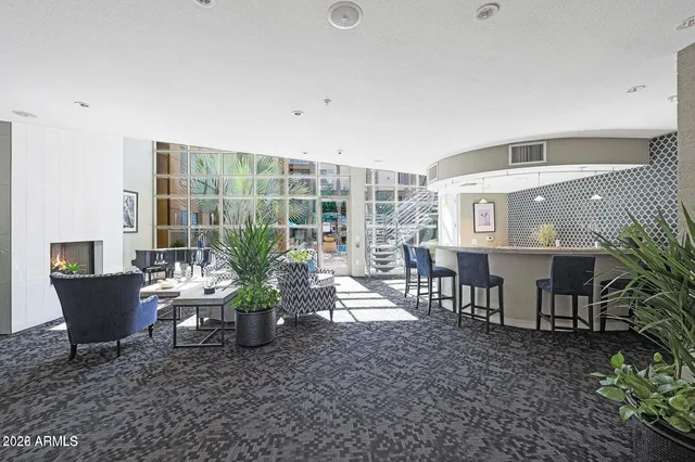 a outdoor living space with furniture and a potted plant