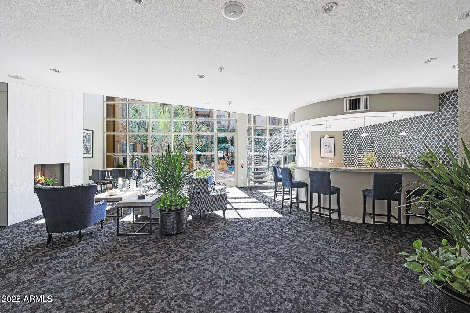 1701 East Colter Street, Unit 11 Phoenix, AZ 85016 - Photo 26 of 31 a view of a dining room with furniture window and outside view