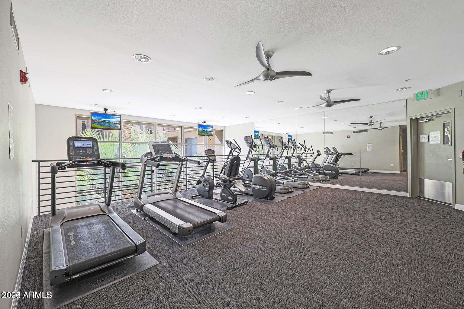 1701 East Colter Street, Unit 11 Phoenix, AZ 85016 - Photo 31 of 31 a room with gym equipment
