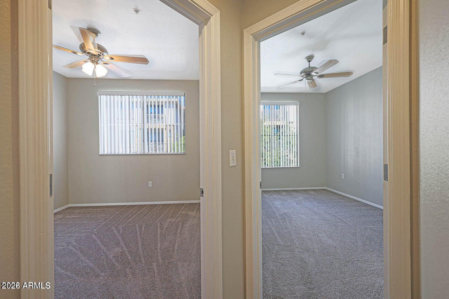 1701 East Colter Street, Unit 11 Phoenix, AZ 85016 - Photo 10 of 31 a view of an empty room with a window