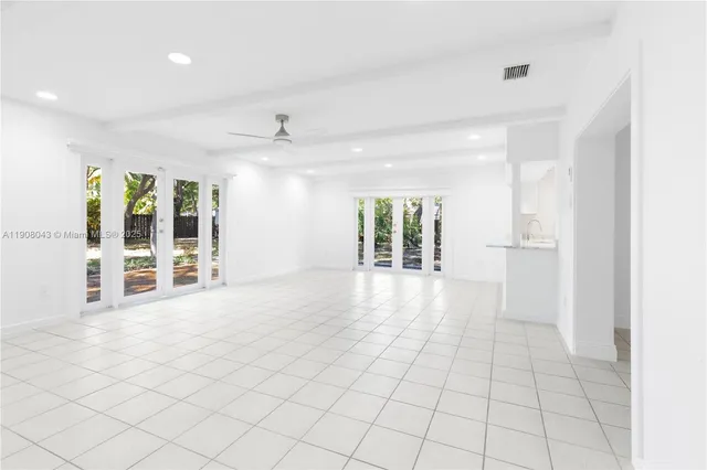 a view of an empty room and window