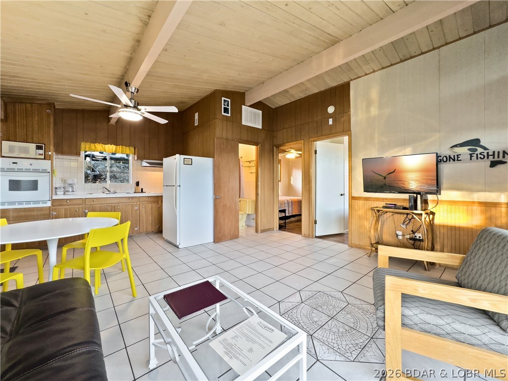 33303 Bass Point Road, Unit 14 Sunrise Beach, MO 65079 - Photo 8 of 34 Living/ Dining/ Kitchen Rooms