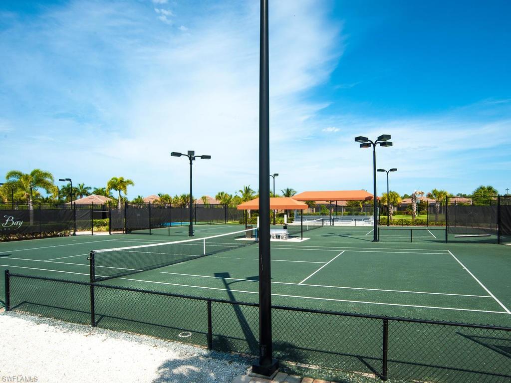 9114 Prima Way, Unit 102 Naples, FL 34113 - Photo 31 of 33 a view of a tennis court
