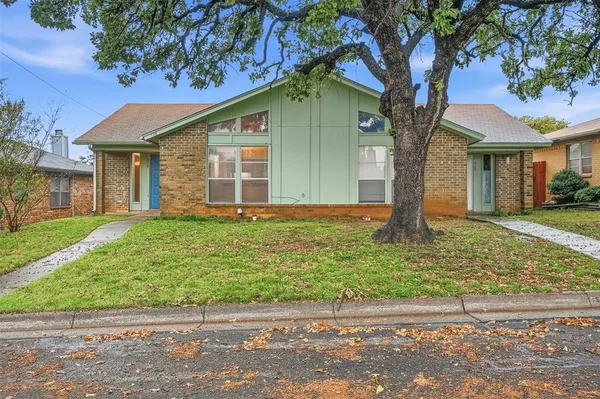 a front view of house with yard
