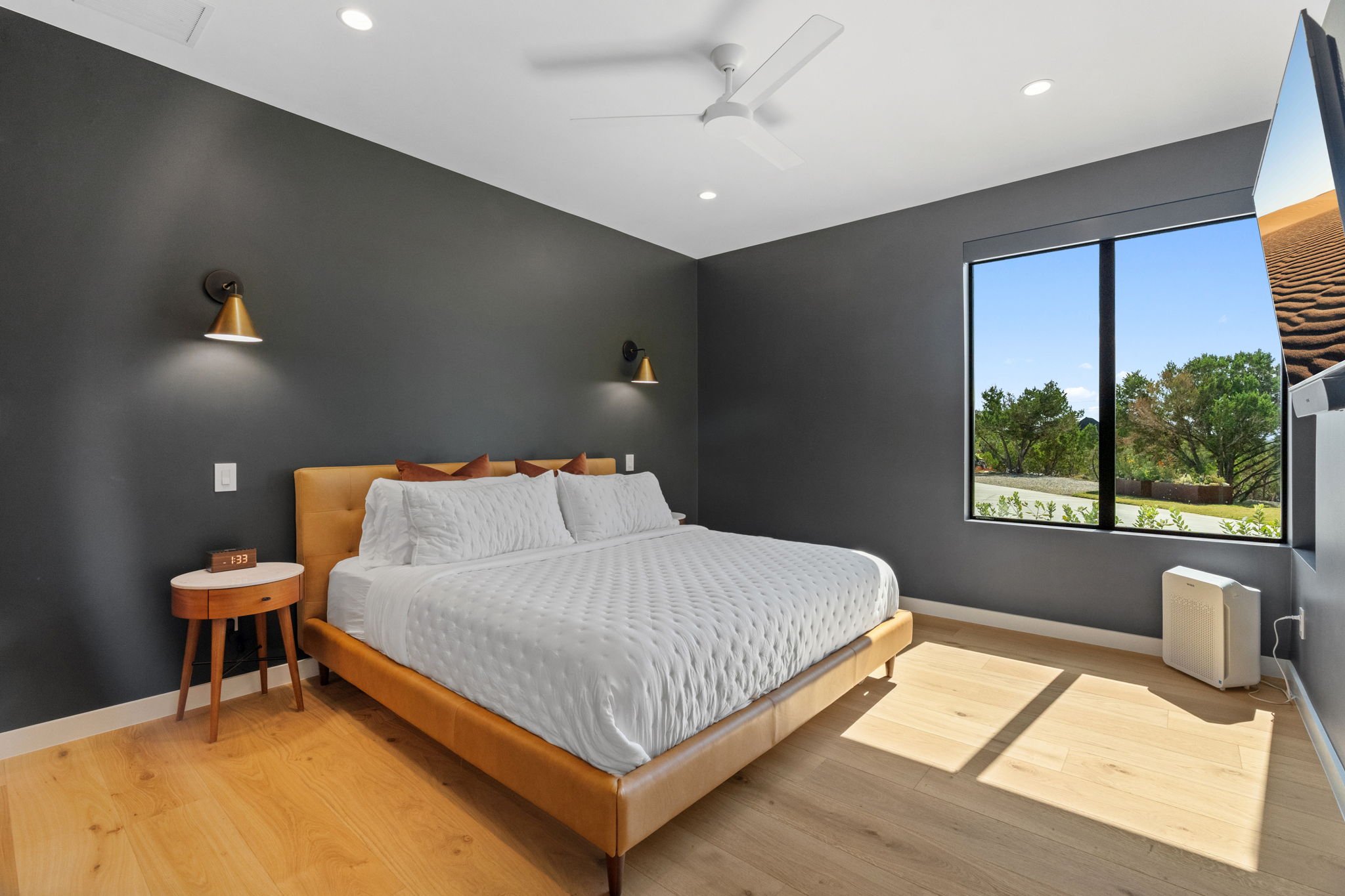 503 Happy Trail Dripping Springs, TX 78620 - Photo 23 of 38 Spacious room featuring light wood-finish flooring, recessed lighting, and a modern ceiling fan