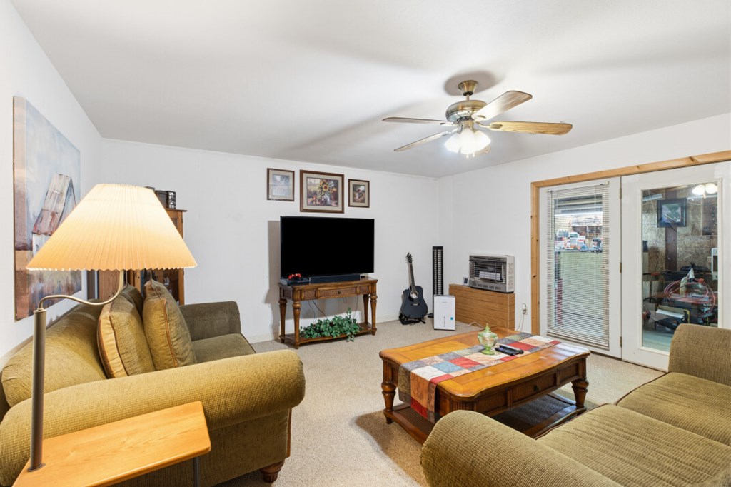 66 Fortenberry Road Young Harris, GA 30582 - Photo 34 of 55 a living room with furniture and a flat screen tv