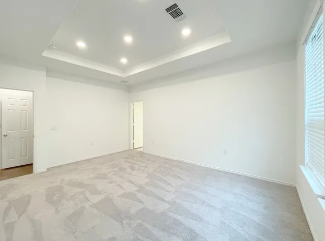 an empty room with a natural light