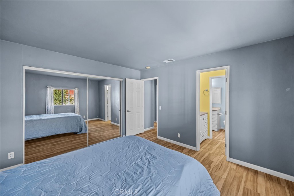 820 Cozy Court Fallbrook, CA 92028 - Photo 18 of 38 a bedroom with a bed and a dresser