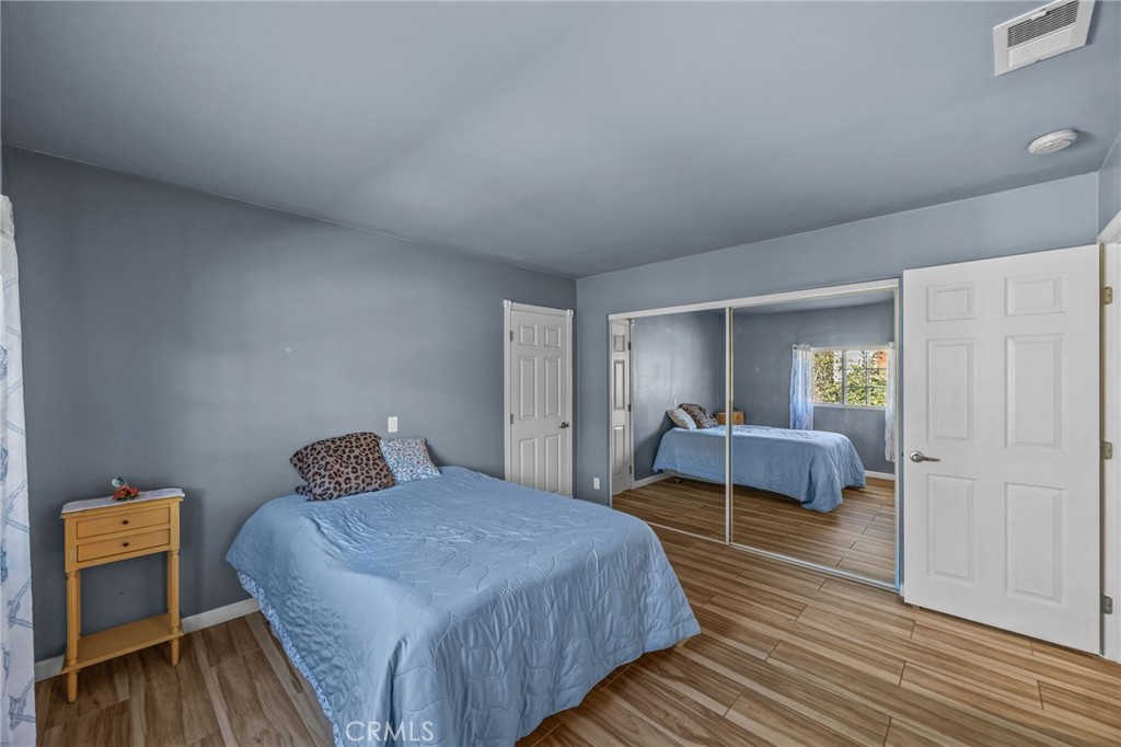 820 Cozy Court Fallbrook, CA 92028 - Photo 19 of 38 a bedroom with a bed and a table