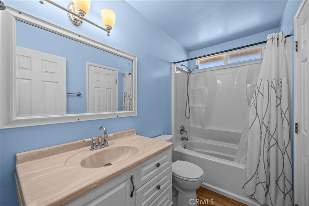 820 Cozy Court Fallbrook, CA 92028 - Photo 24 of 38 a bathroom with a sink toilet tub and shower