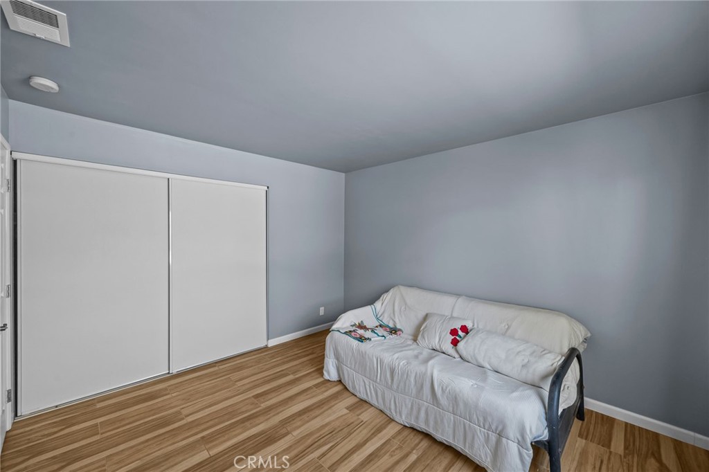 820 Cozy Court Fallbrook, CA 92028 - Photo 26 of 38 a living room with furniture and a wooden floor