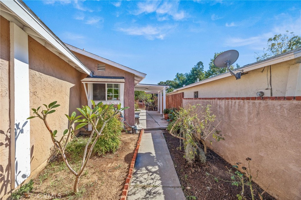 820 Cozy Court Fallbrook, CA 92028 - Photo 3 of 38 a view of a backyard with plants