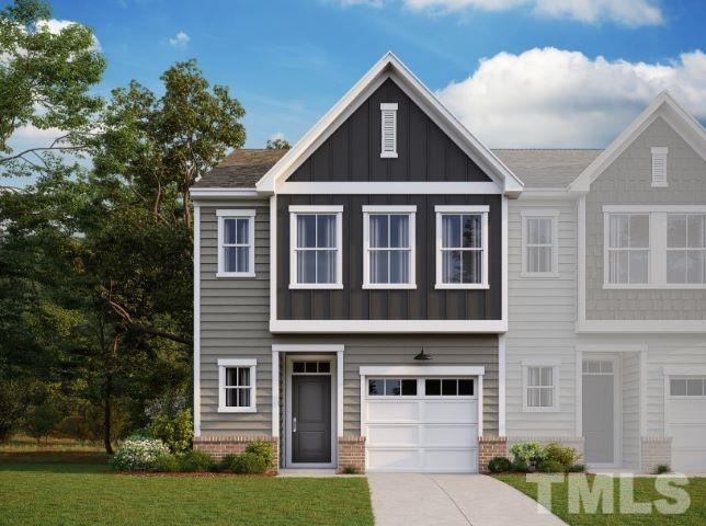 812 Star Rdg Drive Raleigh, NC 27610 - Photo 1 of 23 a front view of a house with a yard
