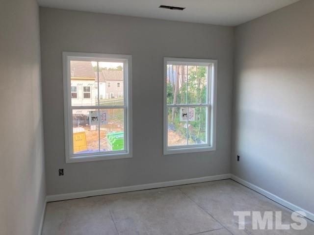 812 Star Rdg Drive Raleigh, NC 27610 - Photo 11 of 23 an empty room with windows