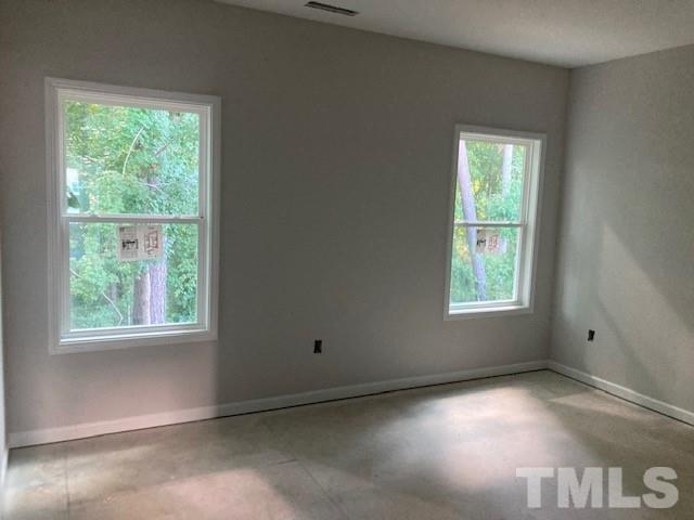 812 Star Rdg Drive Raleigh, NC 27610 - Photo 13 of 23 a view of an empty room with a window
