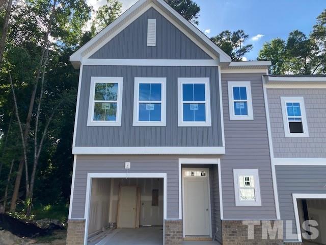 812 Star Rdg Drive Raleigh, NC 27610 - Photo 15 of 23 a front view of a house with a yard