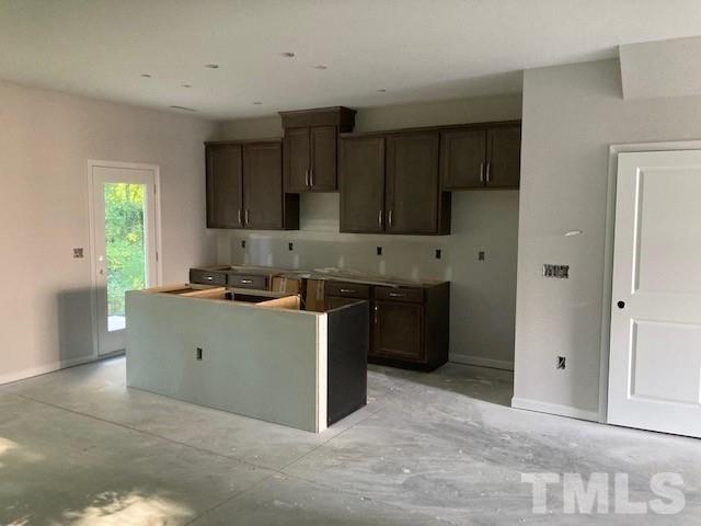 812 Star Rdg Drive Raleigh, NC 27610 - Photo 19 of 23 a kitchen with a cabinets and a stove