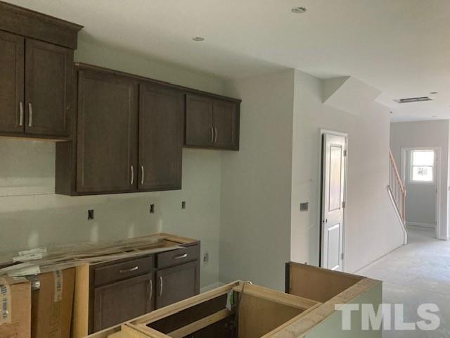 812 Star Rdg Drive Raleigh, NC 27610 - Photo 23 of 23 a kitchen with a sink and cabinets