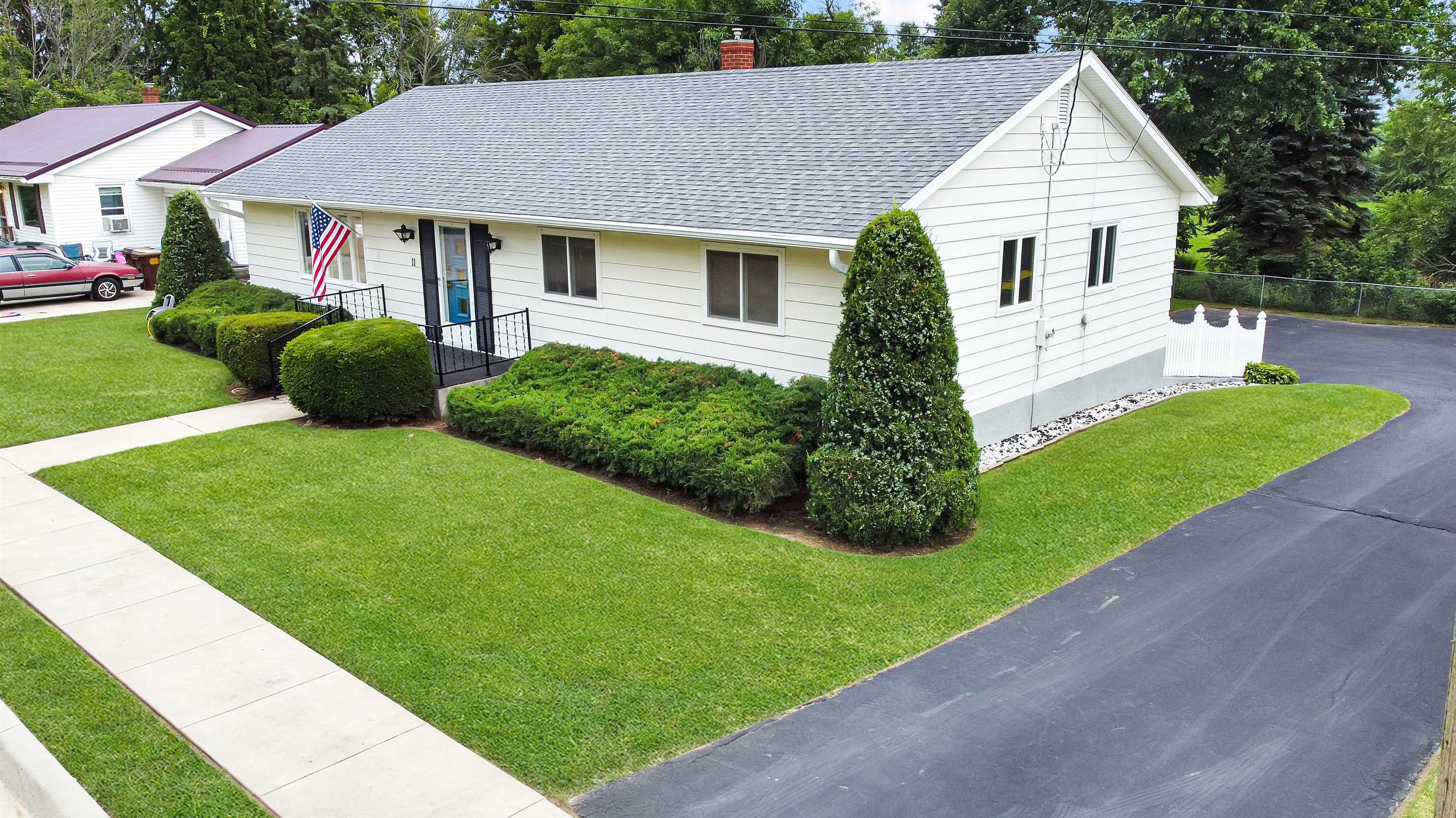 11 East Division Road Shannon, IL 61078 - Photo 2 of 33 a view of a house with a yard