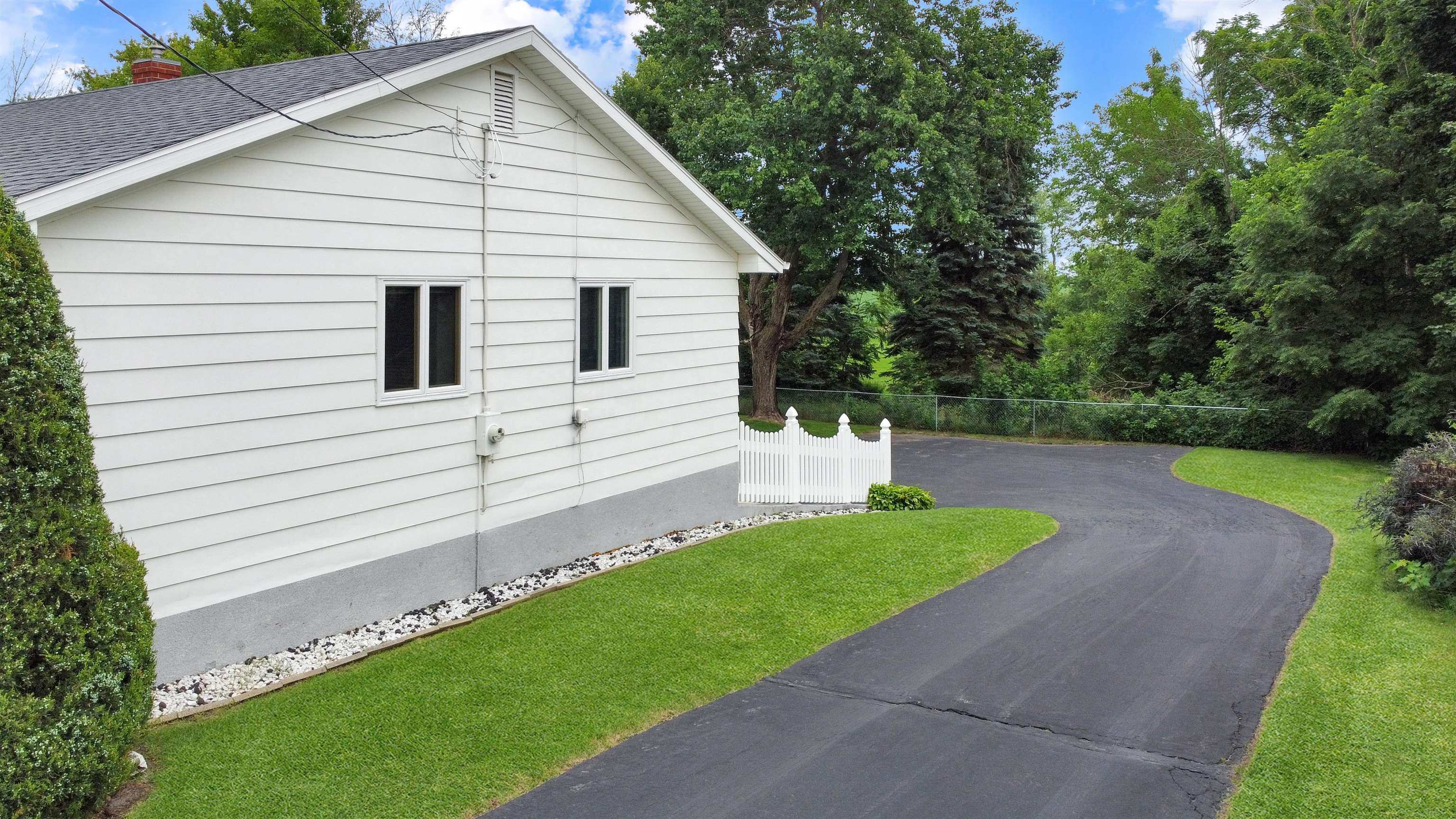 11 East Division Road Shannon, IL 61078 - Photo 29 of 33 a front view of a house with a yard