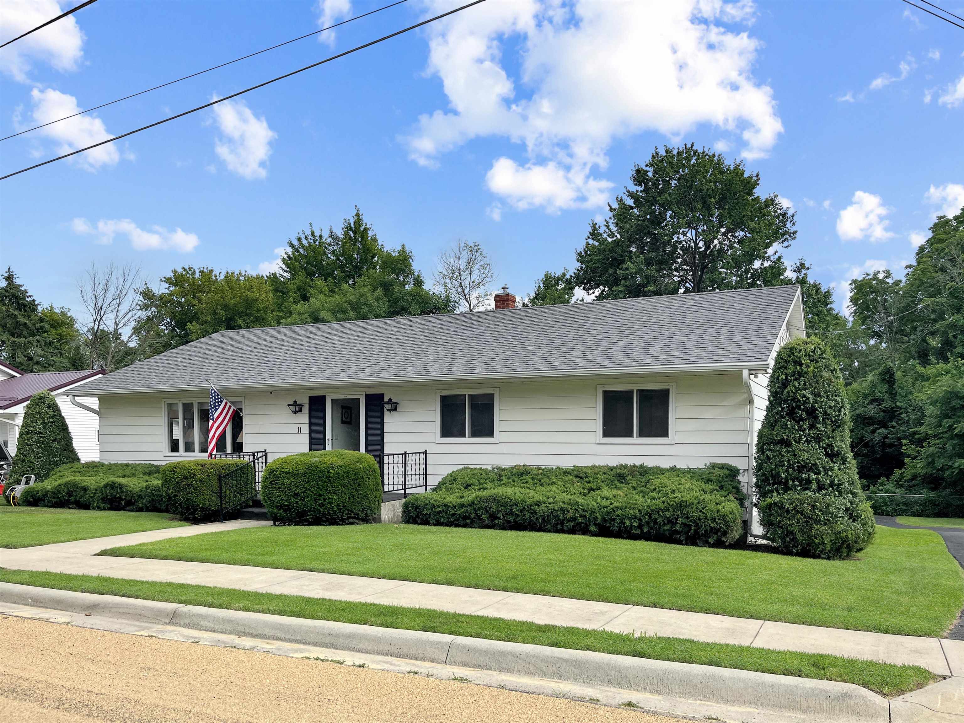 11 East Division Road Shannon, IL 61078 - Photo 32 of 33 a front view of a house with a yard