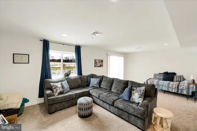 a living room with furniture and a couch