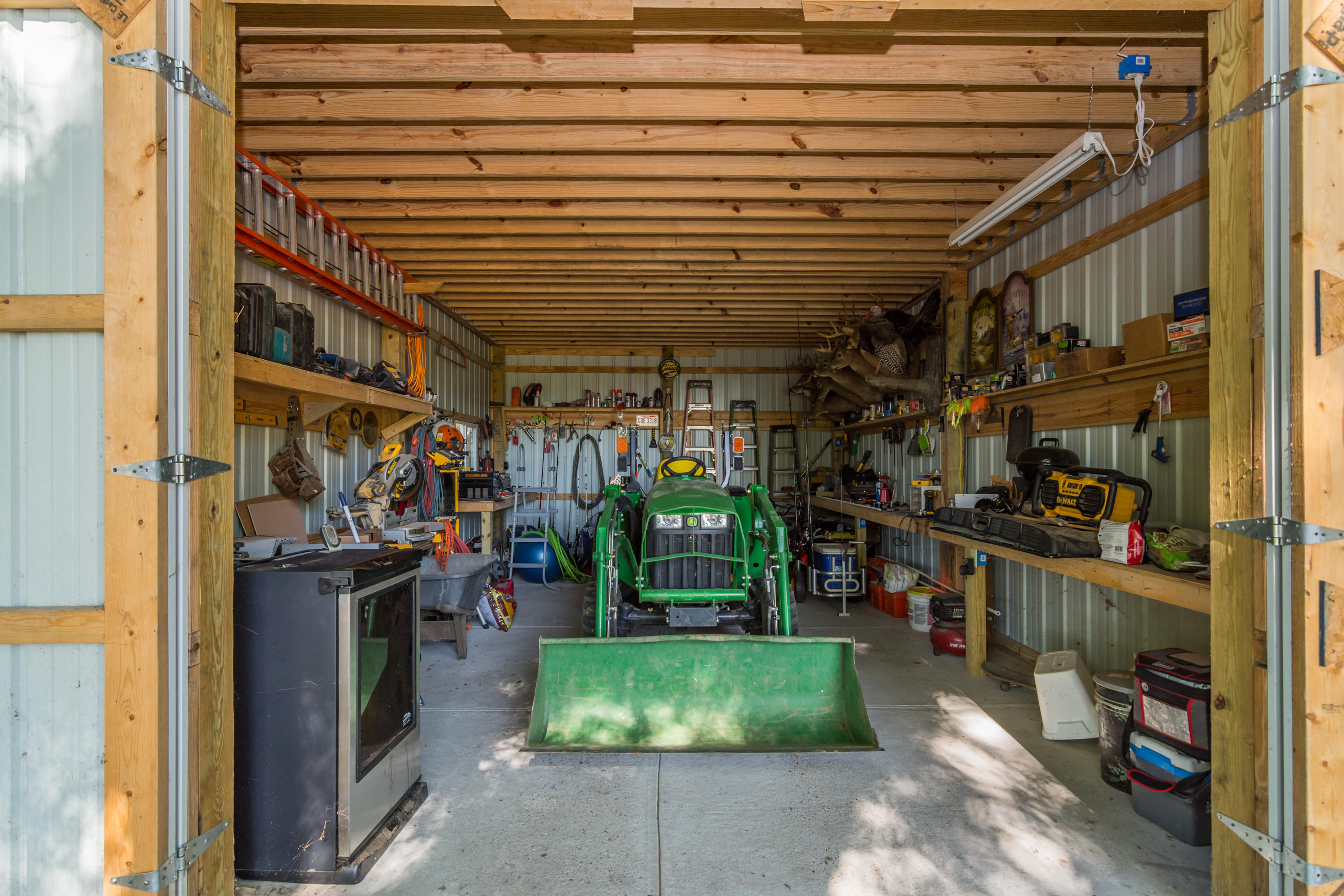 8322 Stokes Road Laurel Hill, FL 32567 - Photo 22 of 25 a view of a storage room