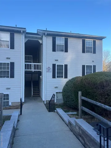 a front view of a house with balcony