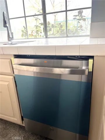 a close view of sink and a window