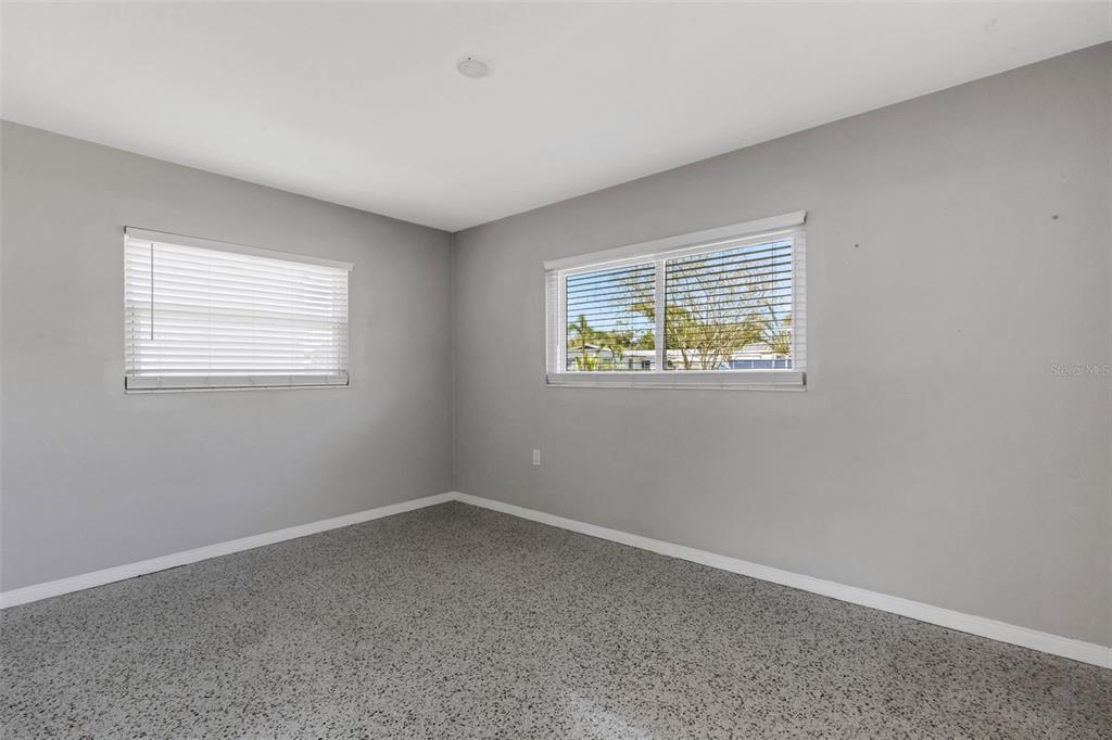 11436 Ridgewood Circle Seminole, FL 33772 - Photo 19 of 38 an empty room with a window