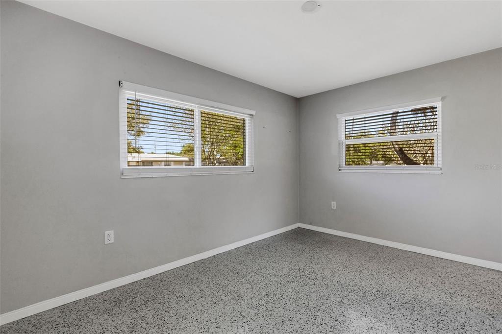 11436 Ridgewood Circle Seminole, FL 33772 - Photo 21 of 38 a view of an empty room with a window