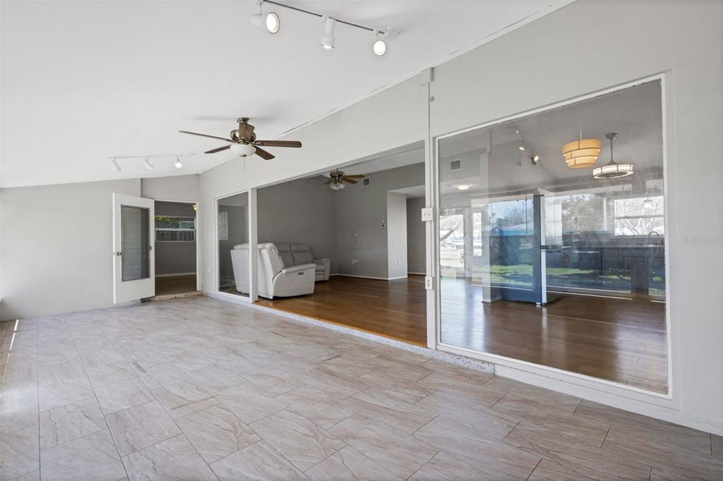 11436 Ridgewood Circle Seminole, FL 33772 - Photo 31 of 38 a view of a livingroom with a ceiling fan and window