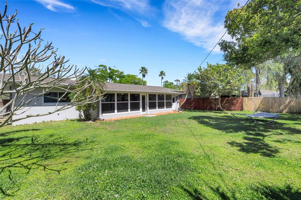 11436 Ridgewood Circle Seminole, FL 33772 - Photo 35 of 38 a front view of a house with a yard