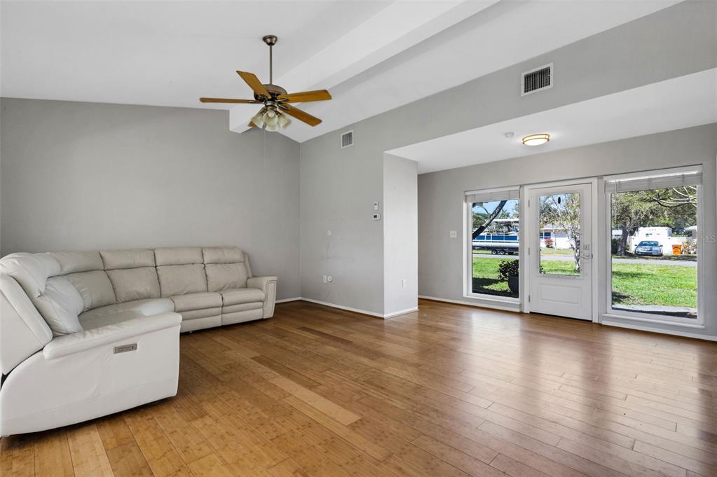 11436 Ridgewood Circle Seminole, FL 33772 - Photo 5 of 38 a living room with furniture and a window