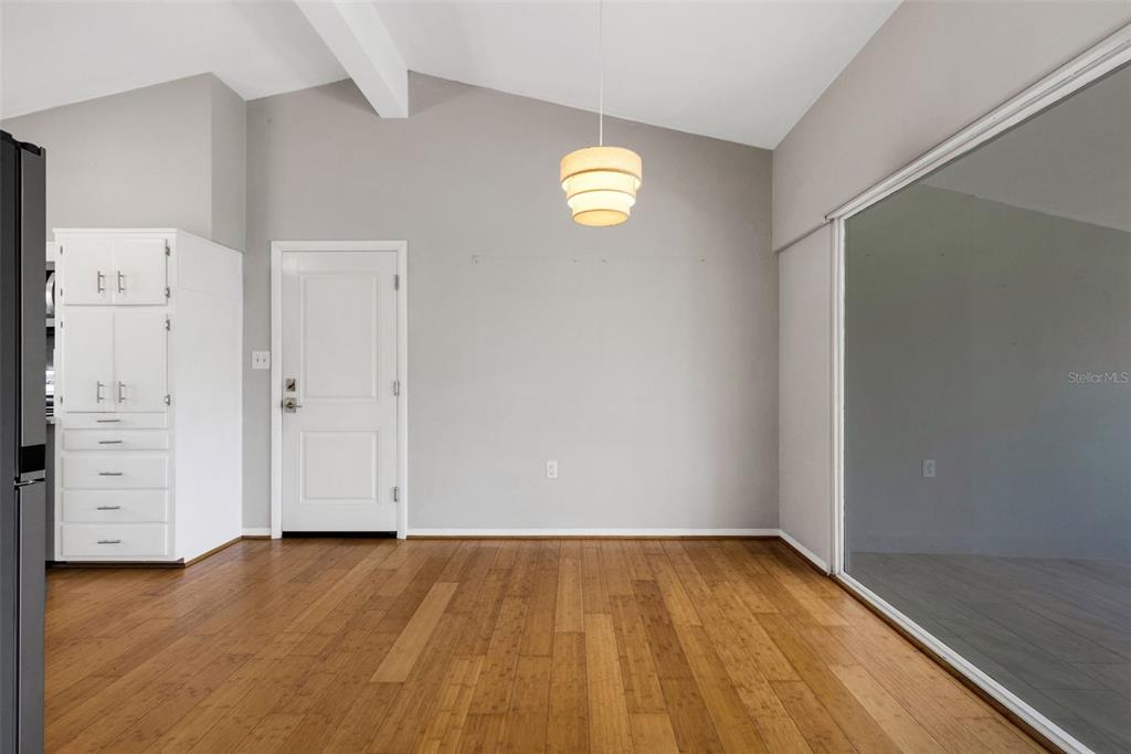 11436 Ridgewood Circle Seminole, FL 33772 - Photo 9 of 38 wooden floor in an empty room
