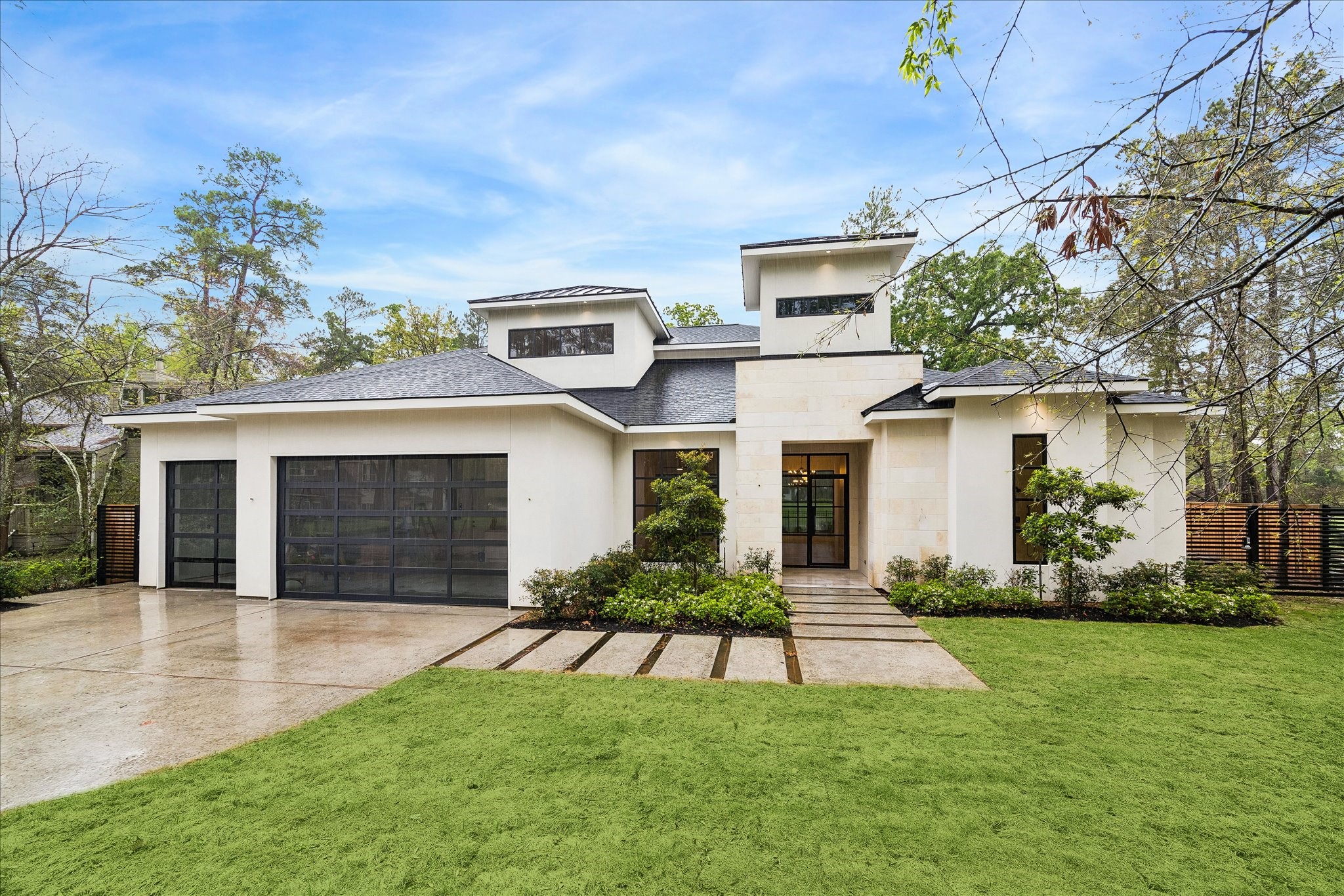 a house view with a garden space