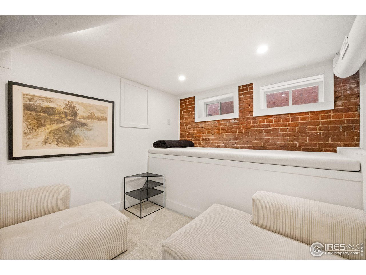 3244 Vallejo Street Denver, CO 80211 - Photo 16 of 32 a living room with furniture and a large window