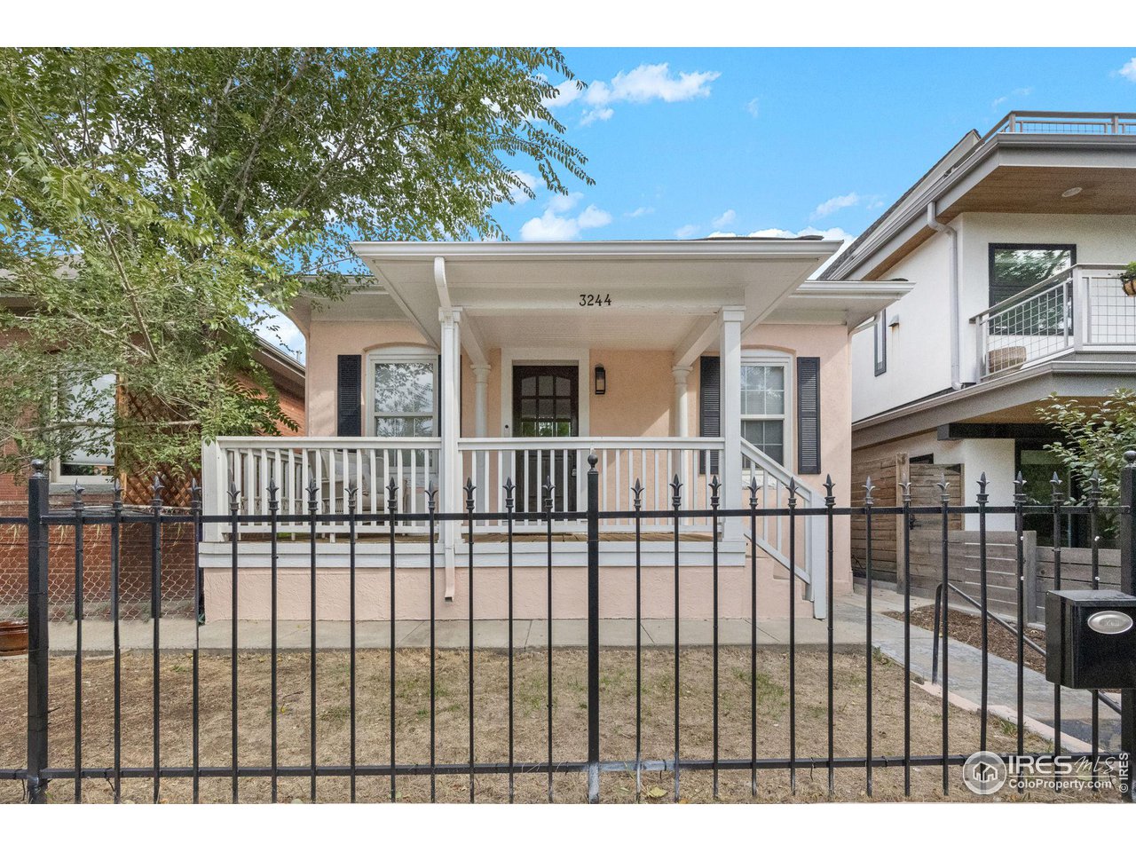 3244 Vallejo Street Denver, CO 80211 - Photo 2 of 32 a view of a house with a balcony