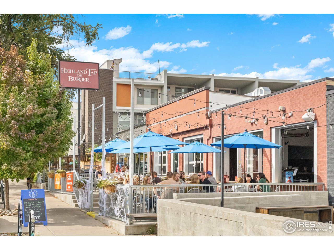 3244 Vallejo Street Denver, CO 80211 - Photo 27 of 32 a front view of a building with street view