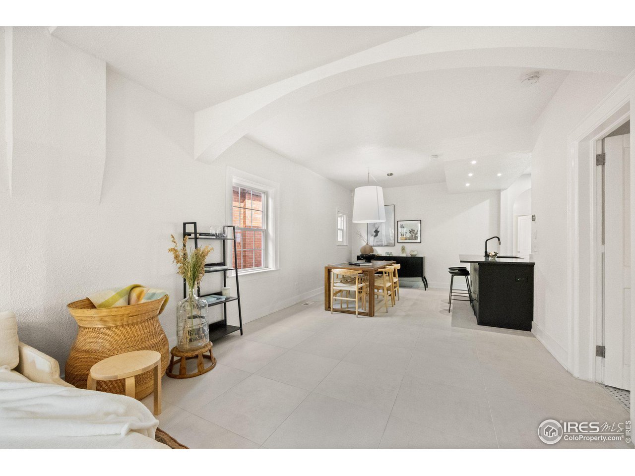 3244 Vallejo Street Denver, CO 80211 - Photo 8 of 32 a living room with furniture and a couch